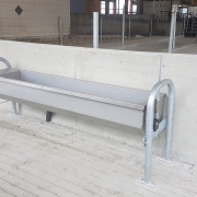 New galvanized cow water trough in dairy cow barn